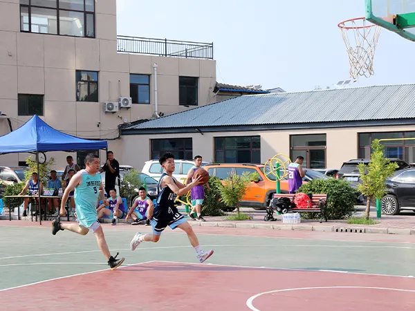 Athlete running toward the basketball hoop