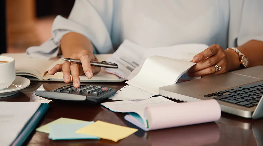 Staff calculating costs