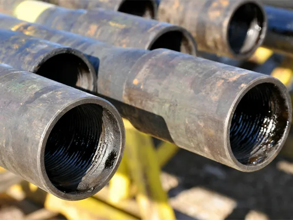 Drill pipe with a tapered shoulder