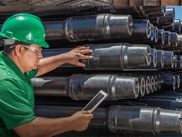Staff is inspecting drill pipes.