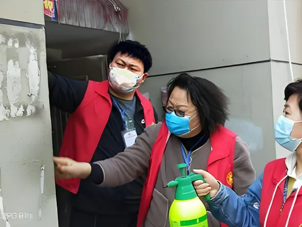 Employees helping clean community building surfaces