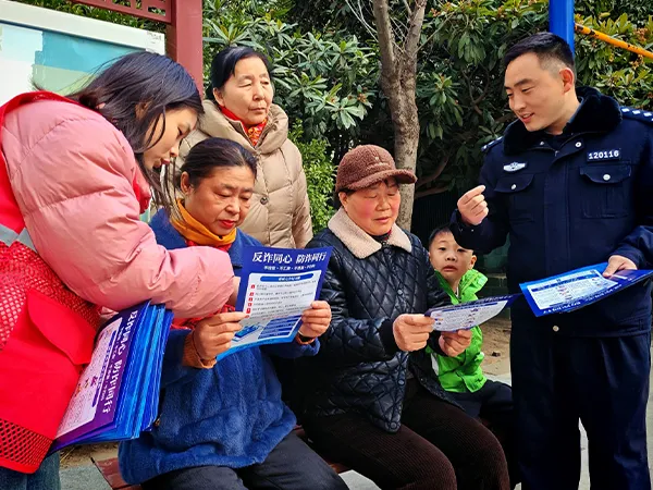 Employees educating residents on anti-fraud awareness