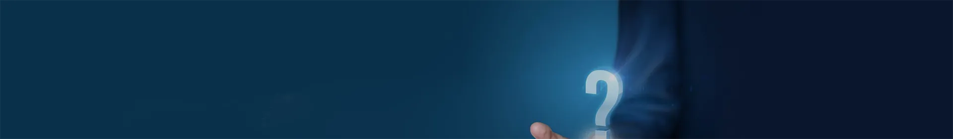 A person holding a question mark in his hand.