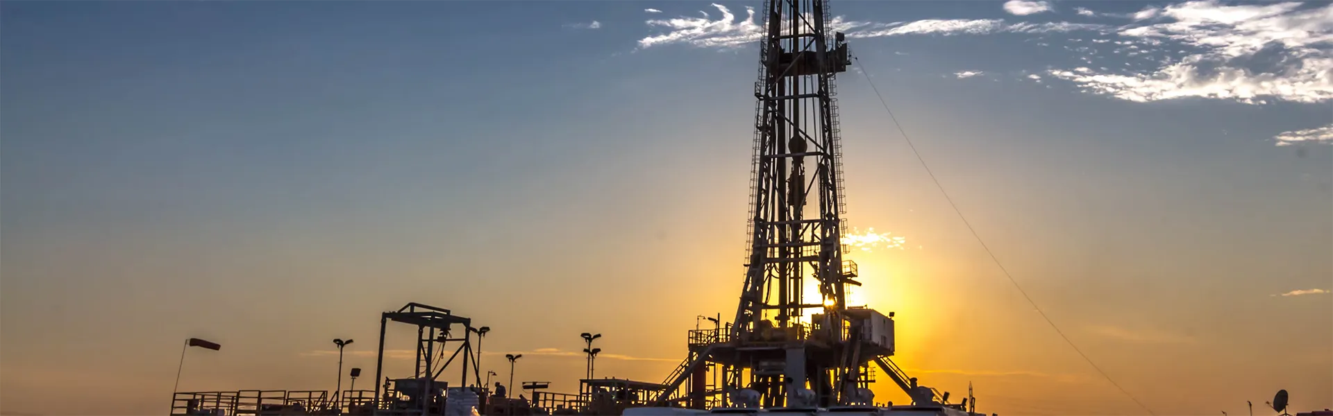  Drilling operations at sunset