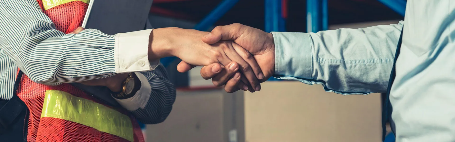 Drilling manager and drilling engineer shaking hands